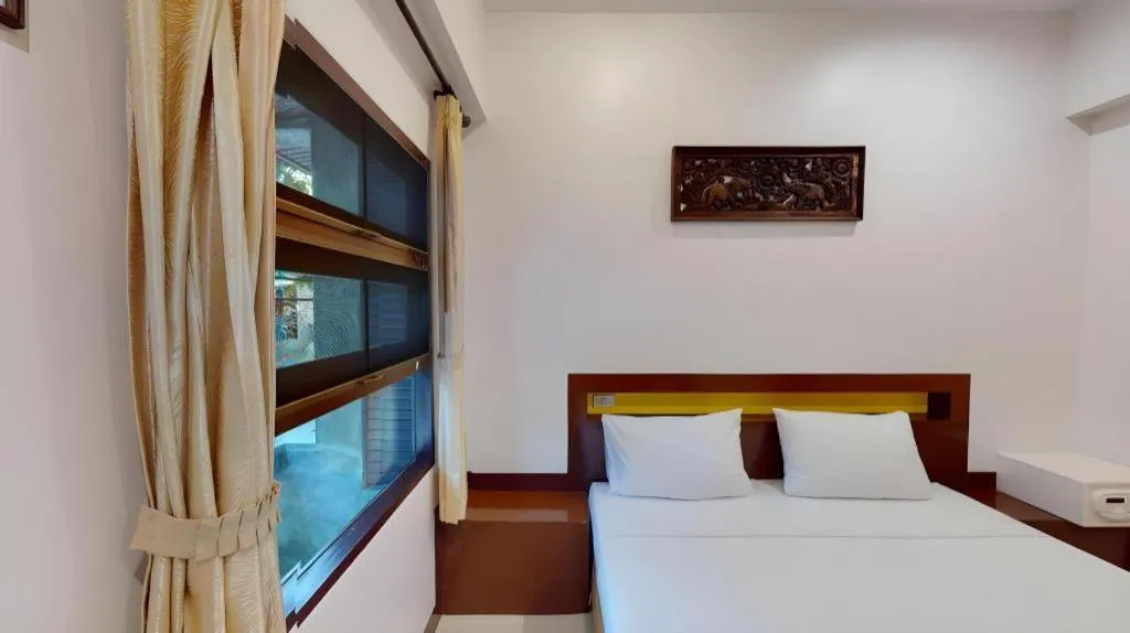 Bed in Lucky Mother Bungalow