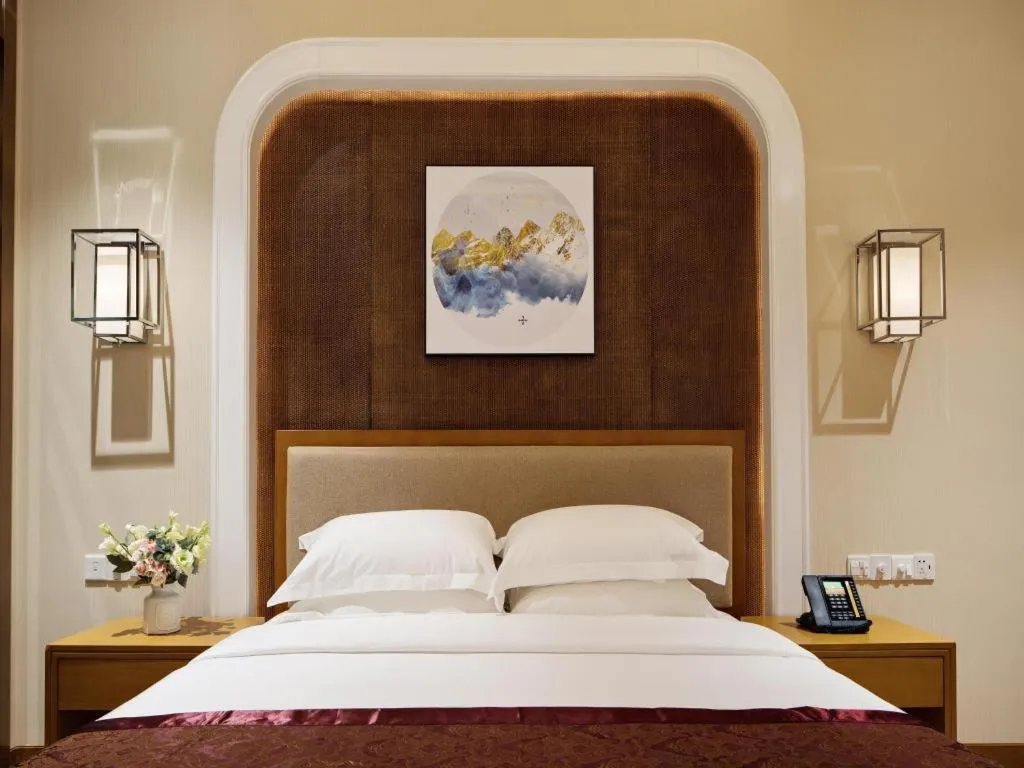 Bed in Cheermore Recreation Hotel Guangzhou Zhimao Yuan Ecological Spa Leisure Hotel