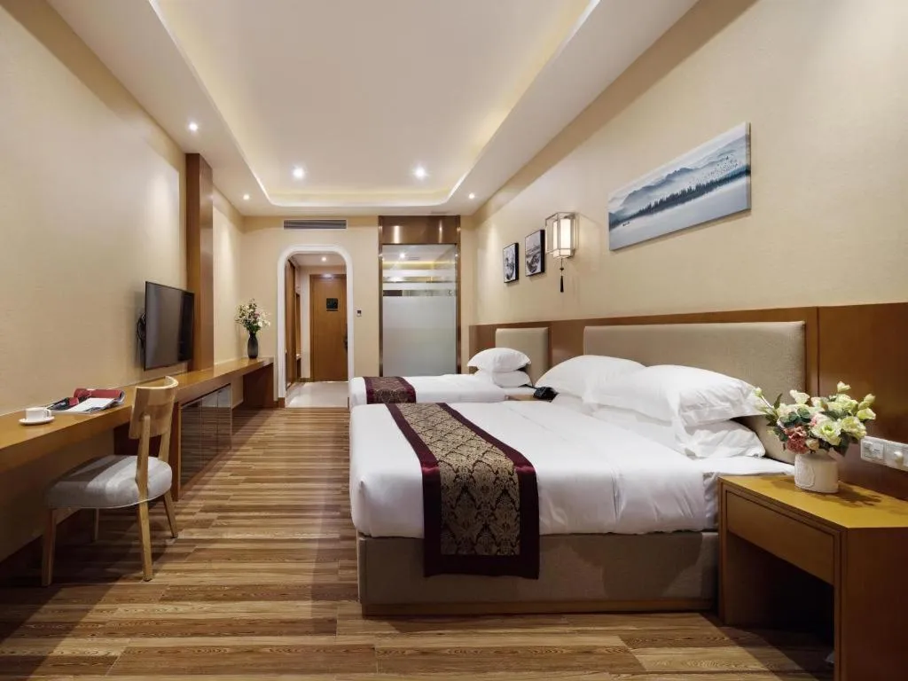 Bed in Cheermore Recreation Hotel Guangzhou Zhimao Yuan Ecological Spa Leisure Hotel