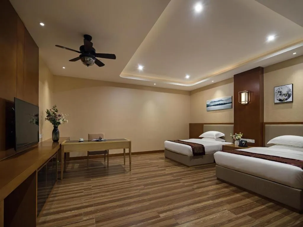 Bed in Cheermore Recreation Hotel Guangzhou Zhimao Yuan Ecological Spa Leisure Hotel