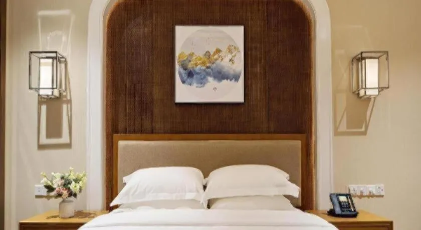 Bed in Cheermore Recreation Hotel Guangzhou Zhimao Yuan Ecological Spa Leisure Hotel