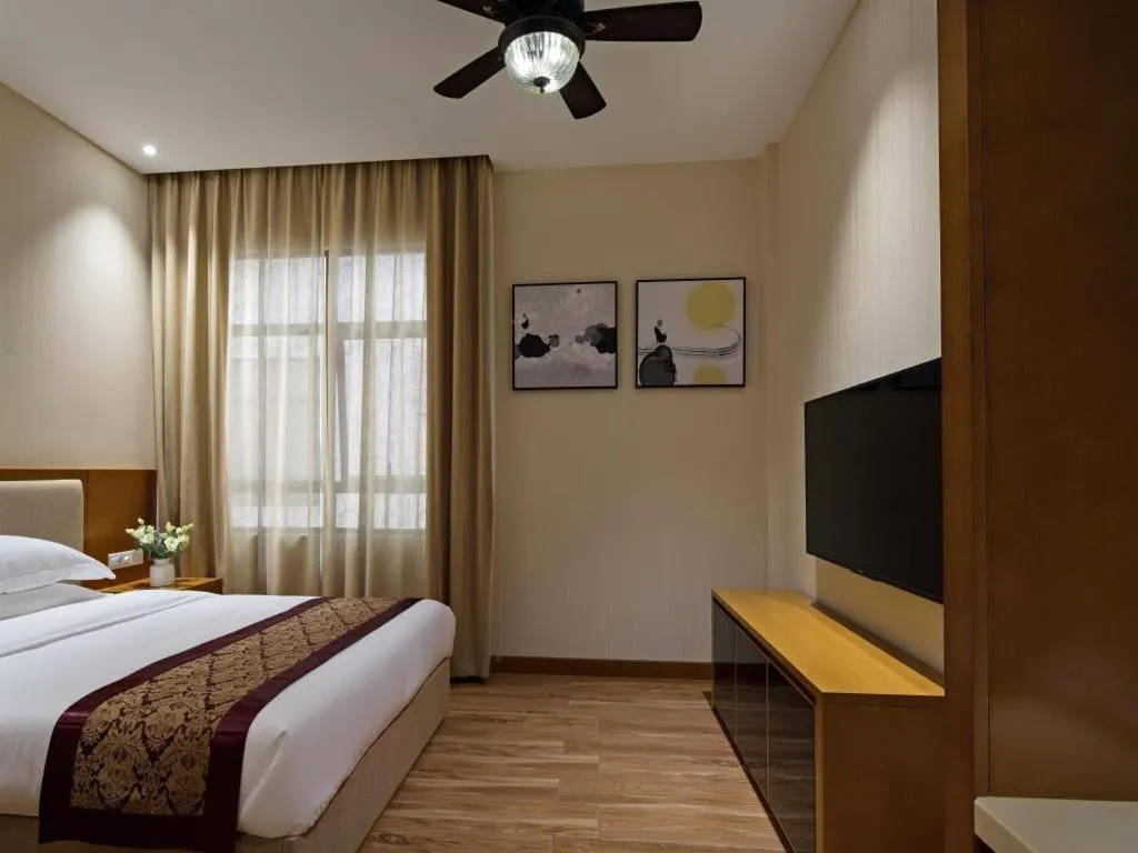 Bed in Cheermore Recreation Hotel Guangzhou Zhimao Yuan Ecological Spa Leisure Hotel
