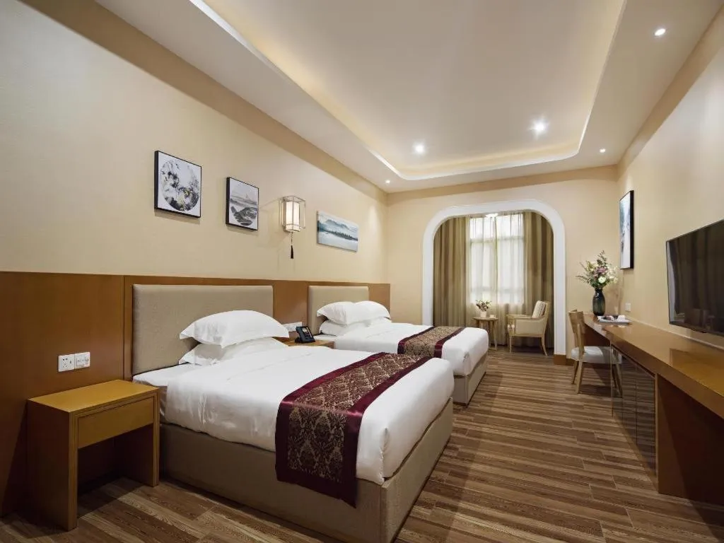 Bed in Cheermore Recreation Hotel Guangzhou Zhimao Yuan Ecological Spa Leisure Hotel