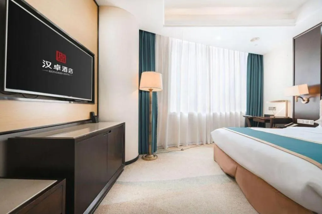 Bed in Hundred Hotel Qingdao
