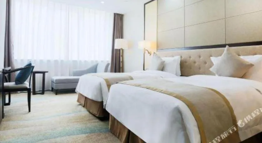 Bed in Hundred Hotel Qingdao