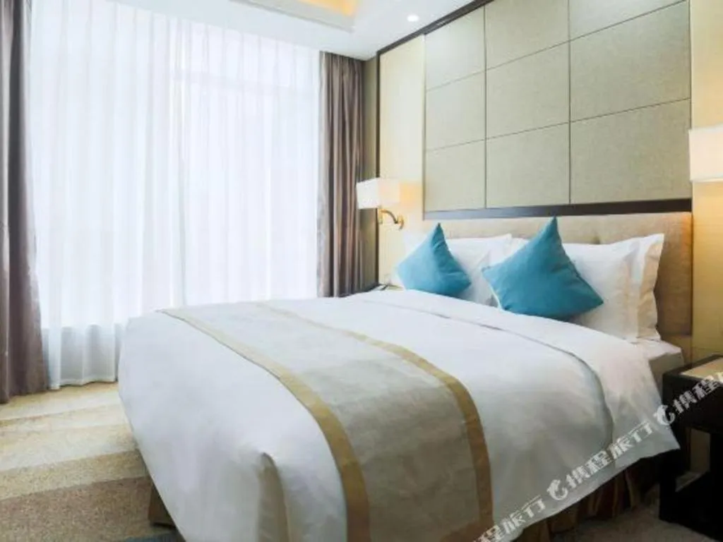 Bed in Hundred Hotel Qingdao