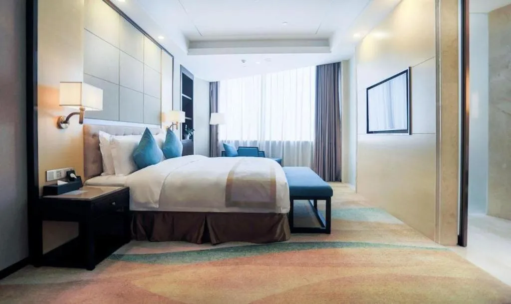 Bed in Hundred Hotel Qingdao