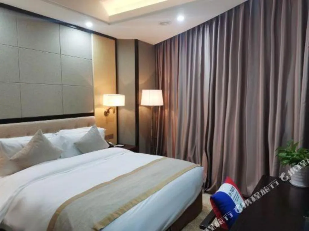 Bed in Hundred Hotel Qingdao