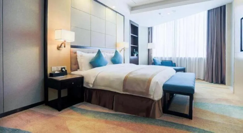 Bed in Hundred Hotel Qingdao