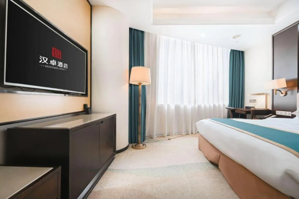 Bed in Hundred Hotel Qingdao