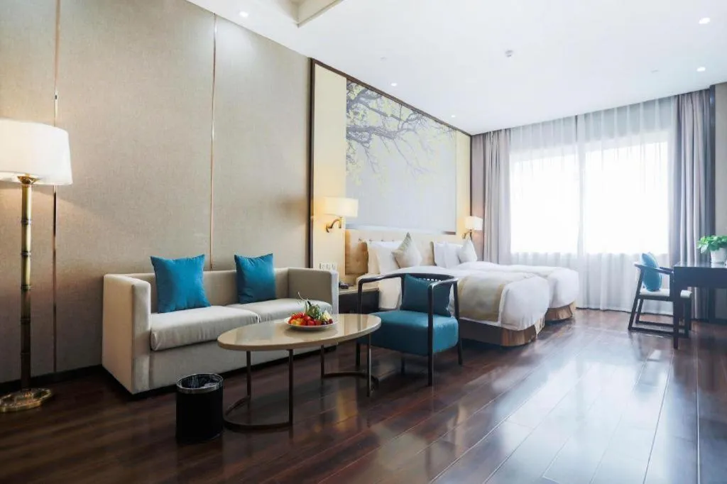 Bed in Hundred Hotel Qingdao