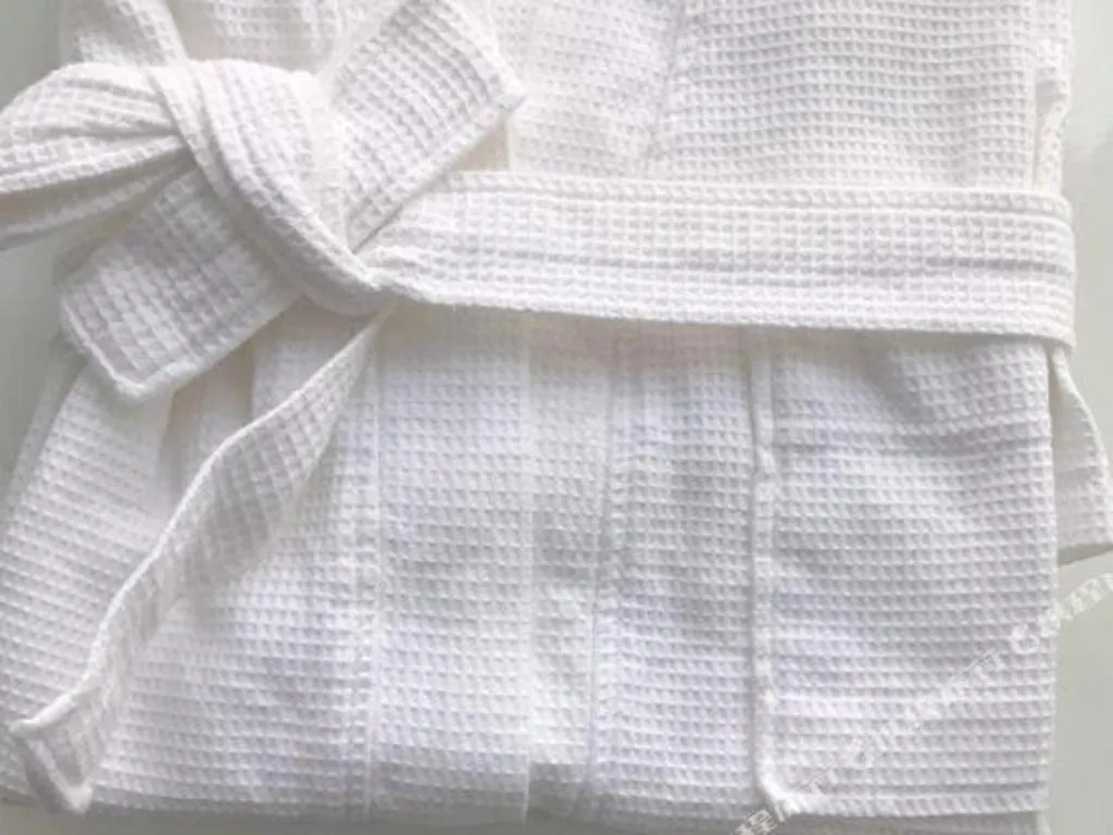 Bed in Hundred Hotel Qingdao