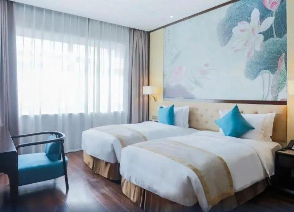 Bed in Hundred Hotel Qingdao