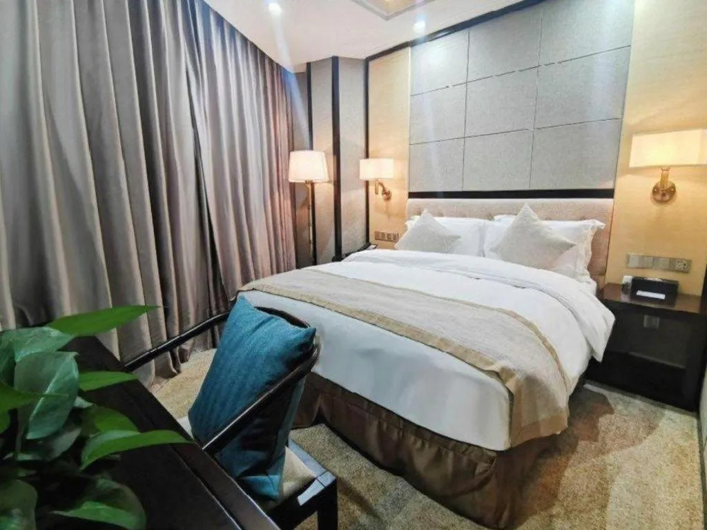Bed in Hundred Hotel Qingdao
