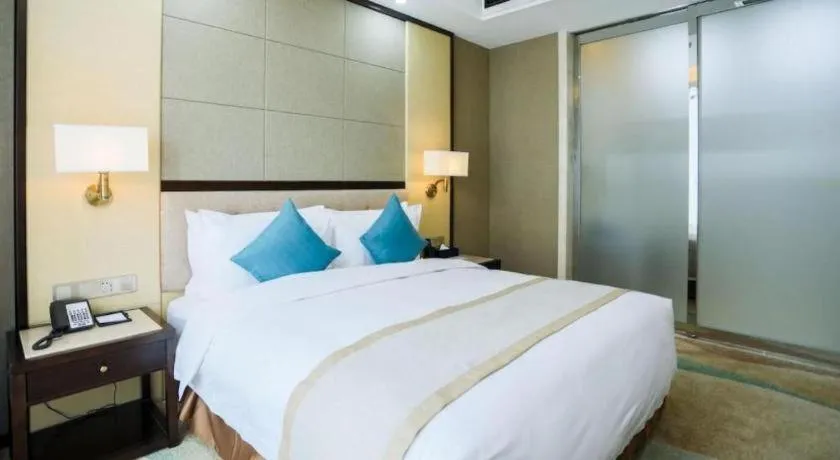 Bed in Hundred Hotel Qingdao