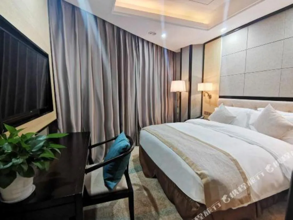 Bed in Hundred Hotel Qingdao