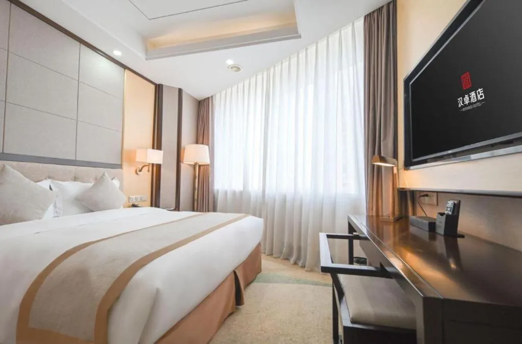 Bed in Hundred Hotel Qingdao