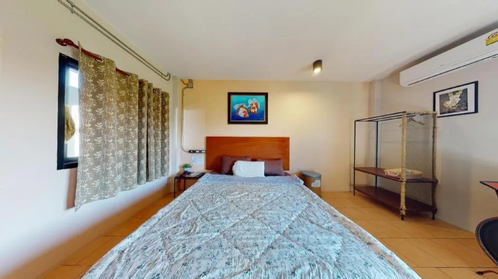 Bed in RiverHills Resort