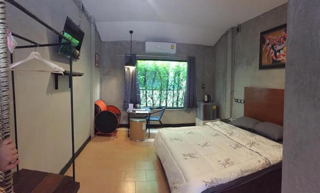 Bed in RiverHills Resort