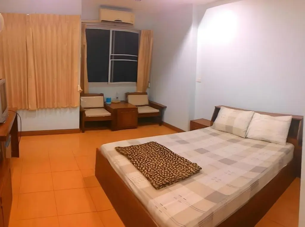 Bed in Chanthanee Hotel Bed in Chanthanee Hotel