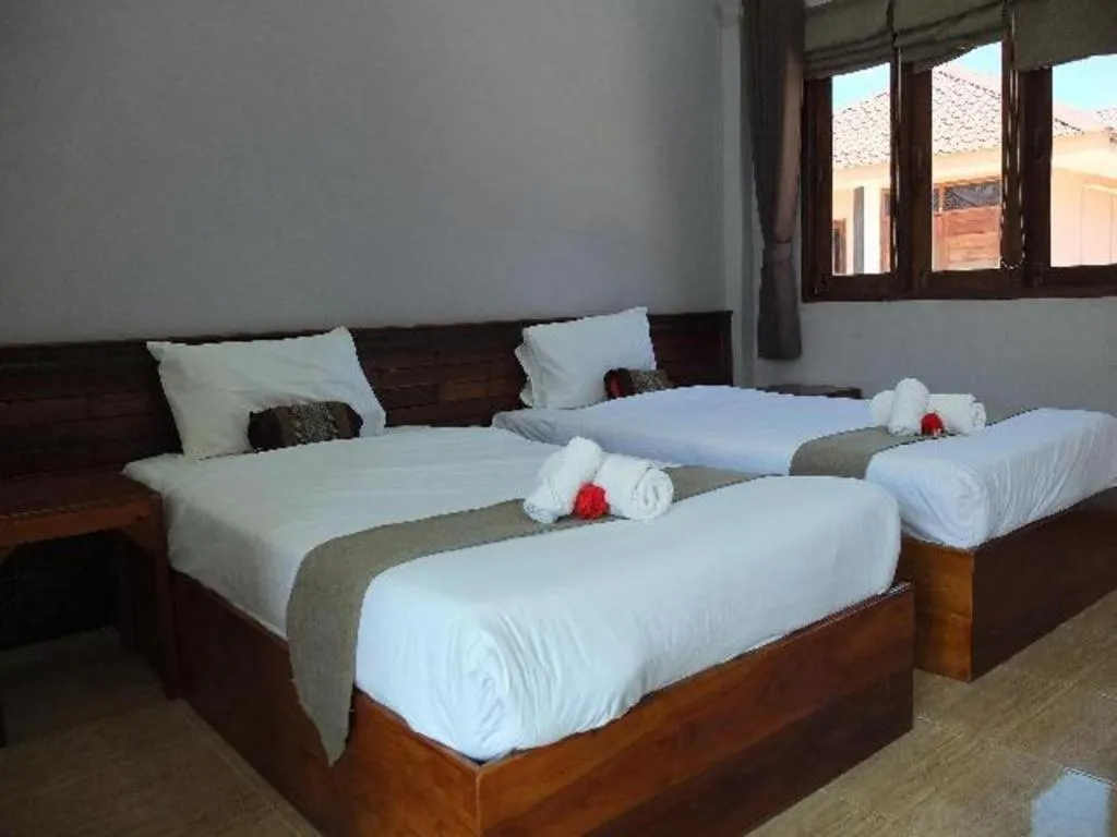 Bed in Baan Home Resort