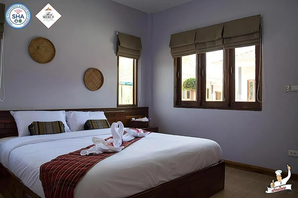 Bed in Baan Home Resort