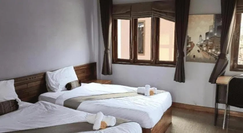 Bed in Baan Home Resort