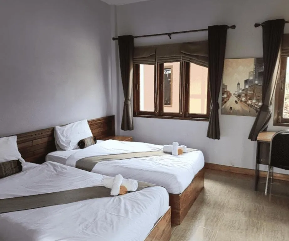 Bed in Baan Home Resort