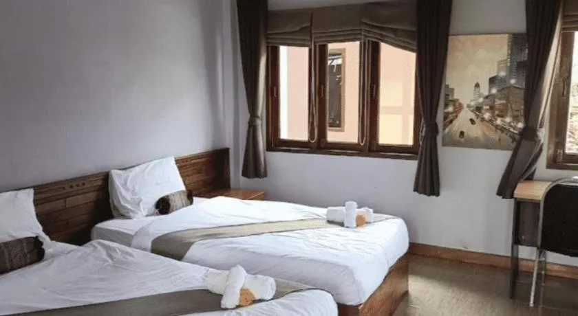 Bed in Baan Home Resort