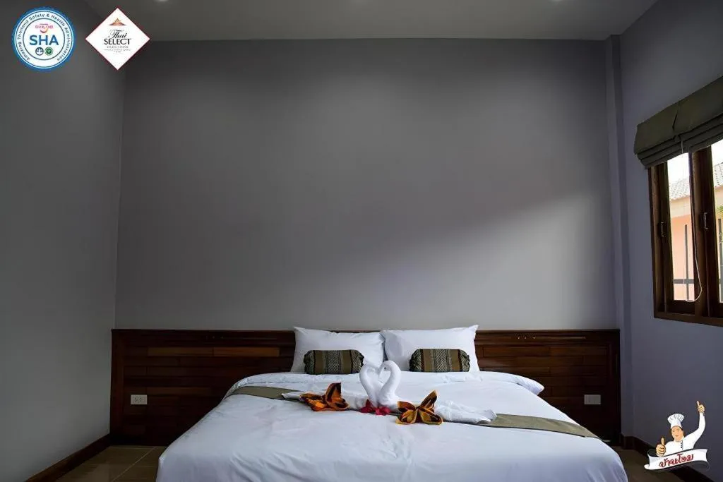 Bed in Baan Home Resort