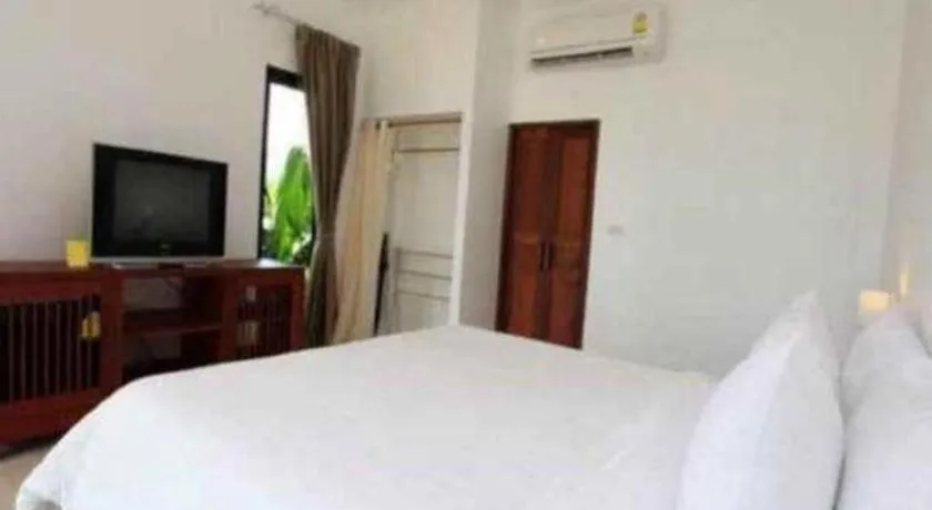 Bed in Villa Phra Chan Resort