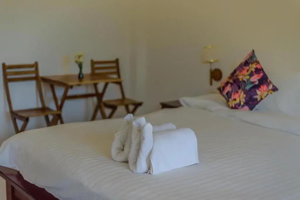 Bed in Villa Phra Chan Resort Bed in Villa Phra Chan Resort