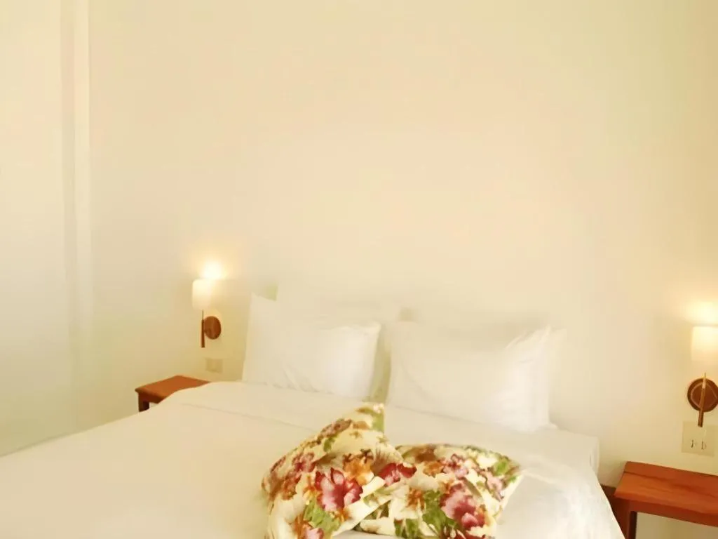 Bed in Villa Phra Chan Resort