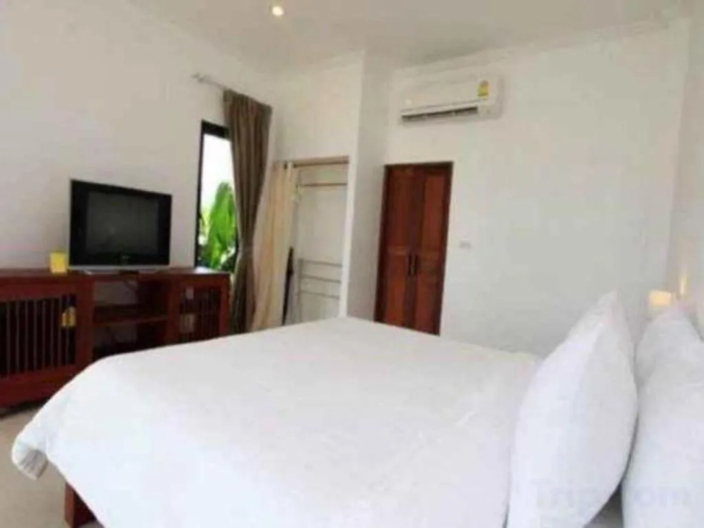Bed in Villa Phra Chan Resort