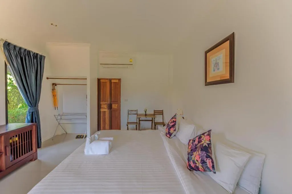 Bed in Villa Phra Chan Resort