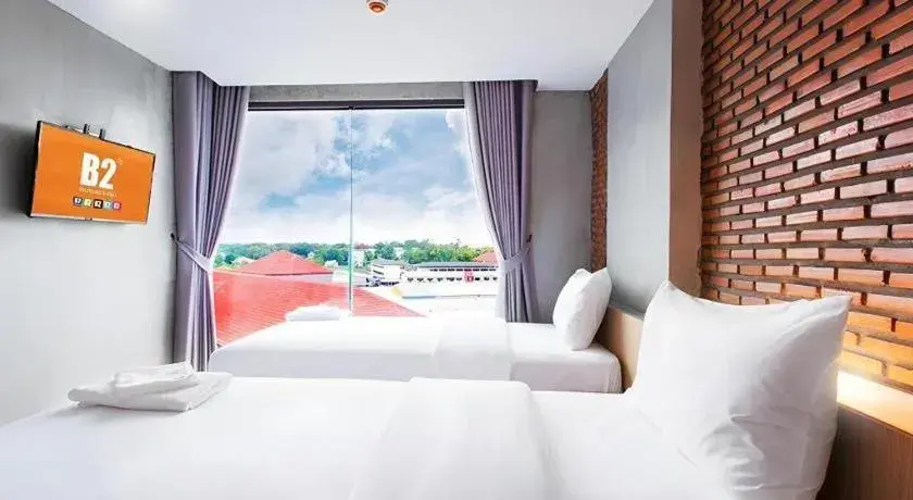 Bed in B2 Mukdahan Boutique and Budget Hotel Bed in B2 Mukdahan Boutique and Budget Hotel