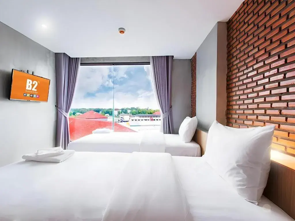 Bed in B2 Mukdahan Boutique and Budget Hotel Bed in B2 Mukdahan Boutique and Budget Hotel