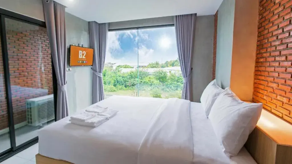 Bed in B2 Mukdahan Boutique and Budget Hotel Bed in B2 Mukdahan Boutique and Budget Hotel