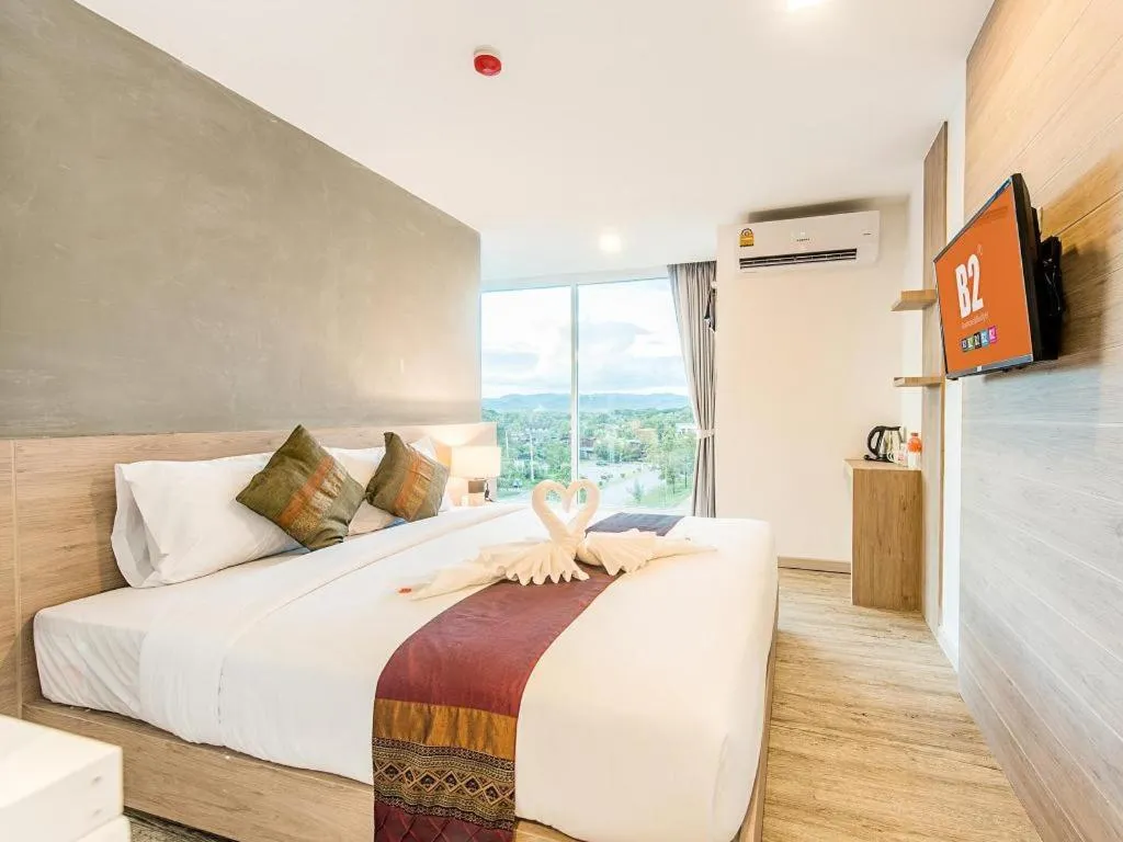 Bed in B2 Phrae Boutique and Budget Hotel