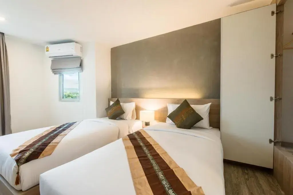Bed in B2 Phrae Boutique and Budget Hotel Bed in B2 Phrae Boutique and Budget Hotel