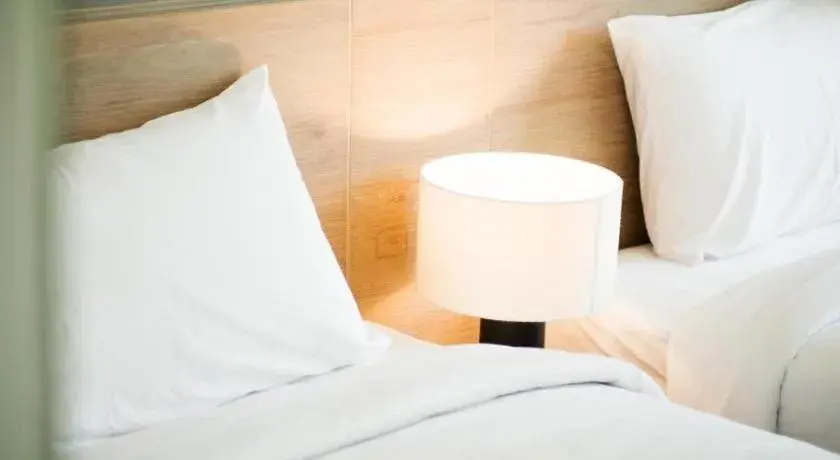 Bed in B2 Phrae Boutique and Budget Hotel Bed in B2 Phrae Boutique and Budget Hotel