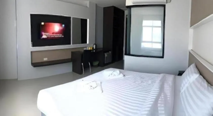 Bed in S-Tawan Hotel & Convention