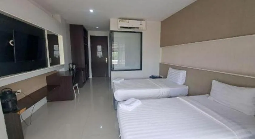 Bed in S-Tawan Hotel & Convention