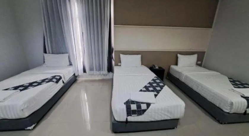 Bed in S-Tawan Hotel & Convention