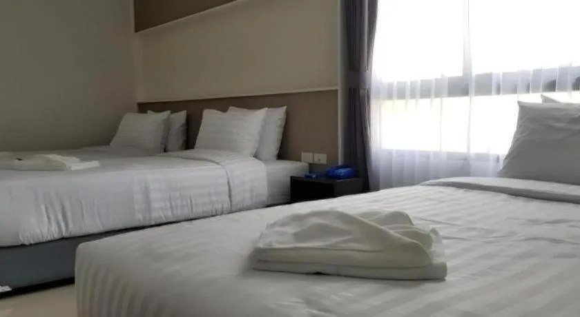 Bed in S-Tawan Hotel & Convention