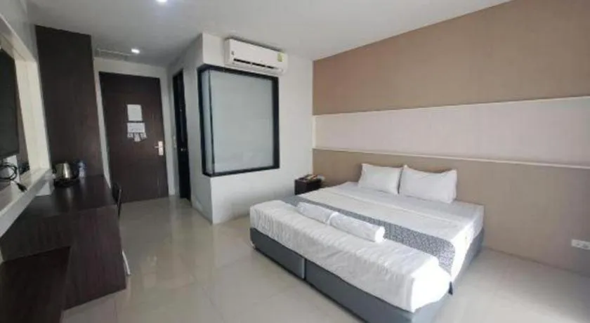 Bed in S-Tawan Hotel & Convention