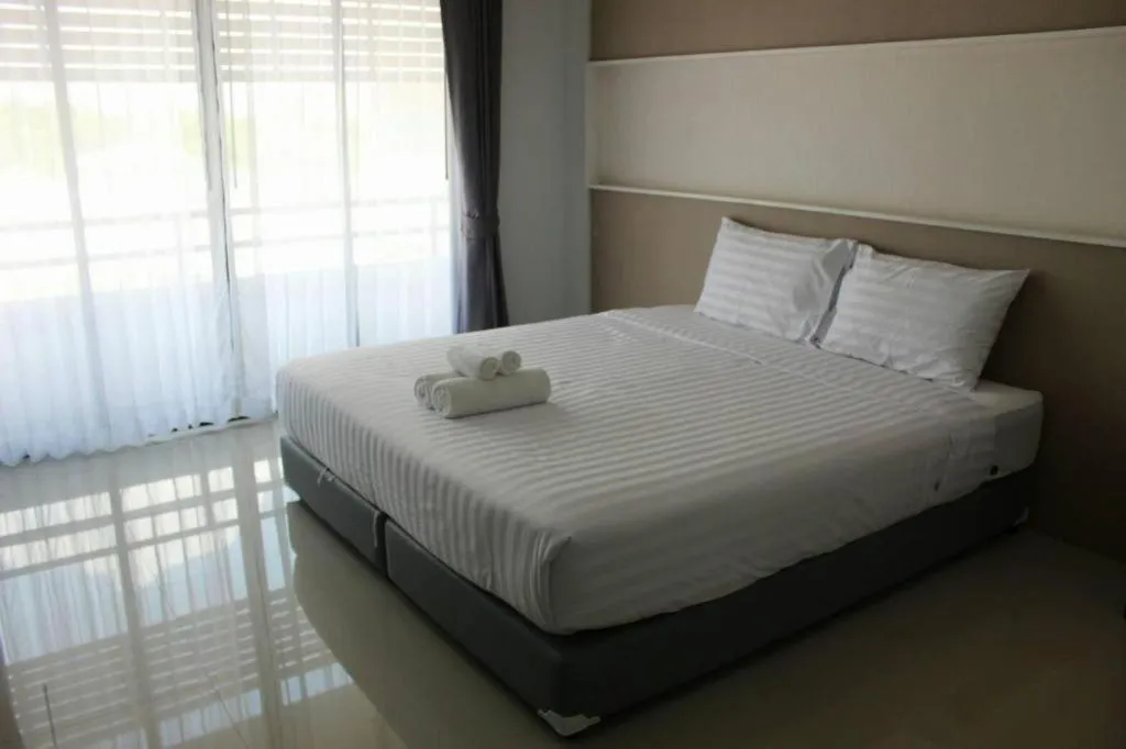 Bed in S-Tawan Hotel & Convention