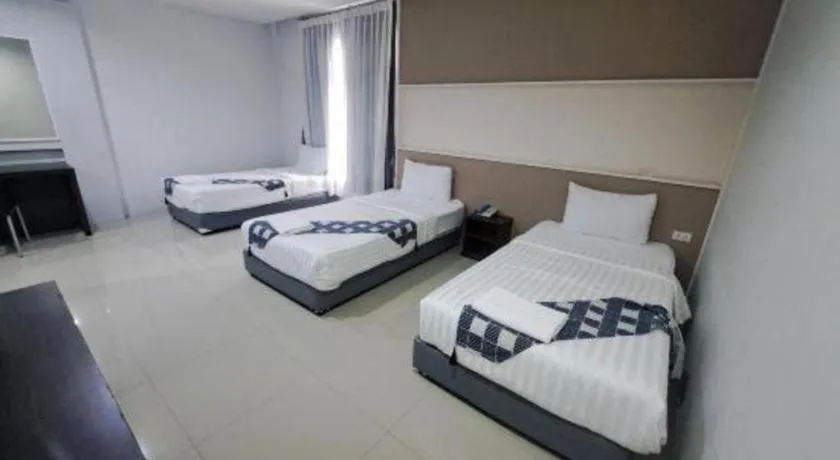 Bed in S-Tawan Hotel & Convention