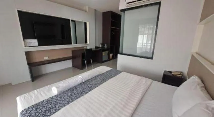 Bed in S-Tawan Hotel & Convention