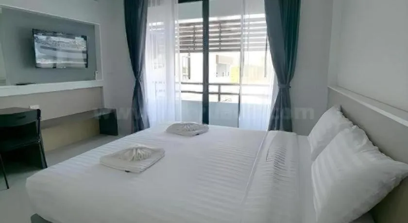 Bed in S-Tawan Hotel & Convention